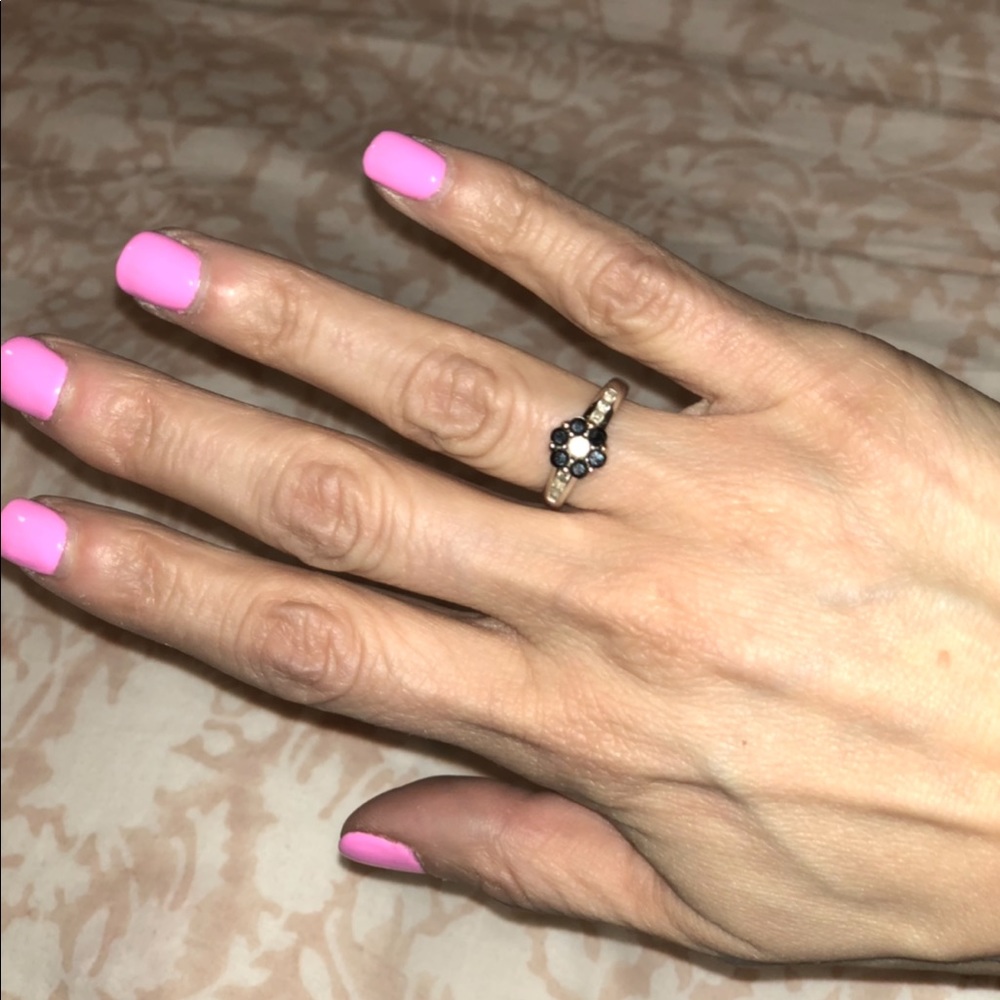 Real Diamond flower ring with black diamonds